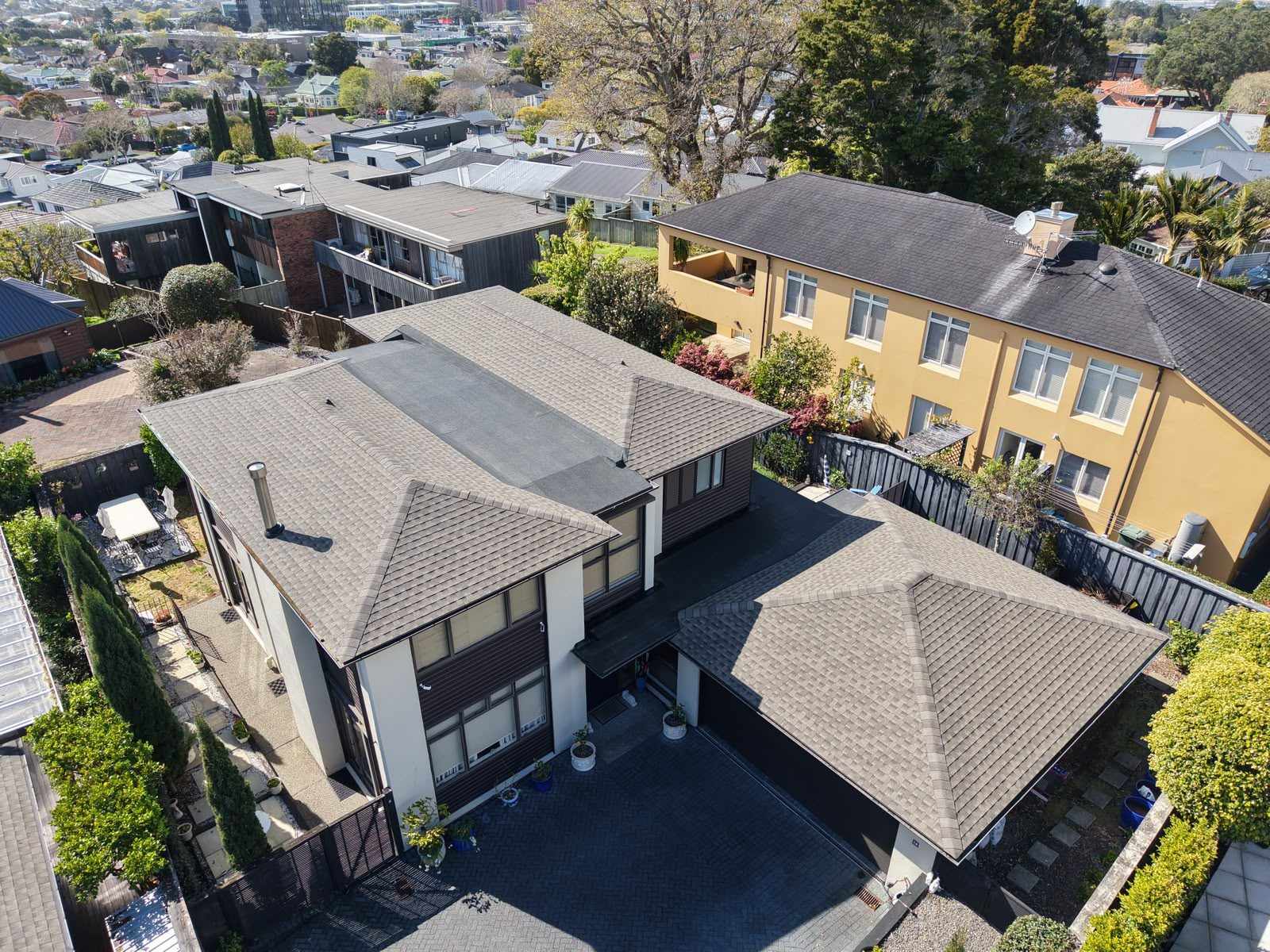 Aerial view of roofs across a South Auckland suburb