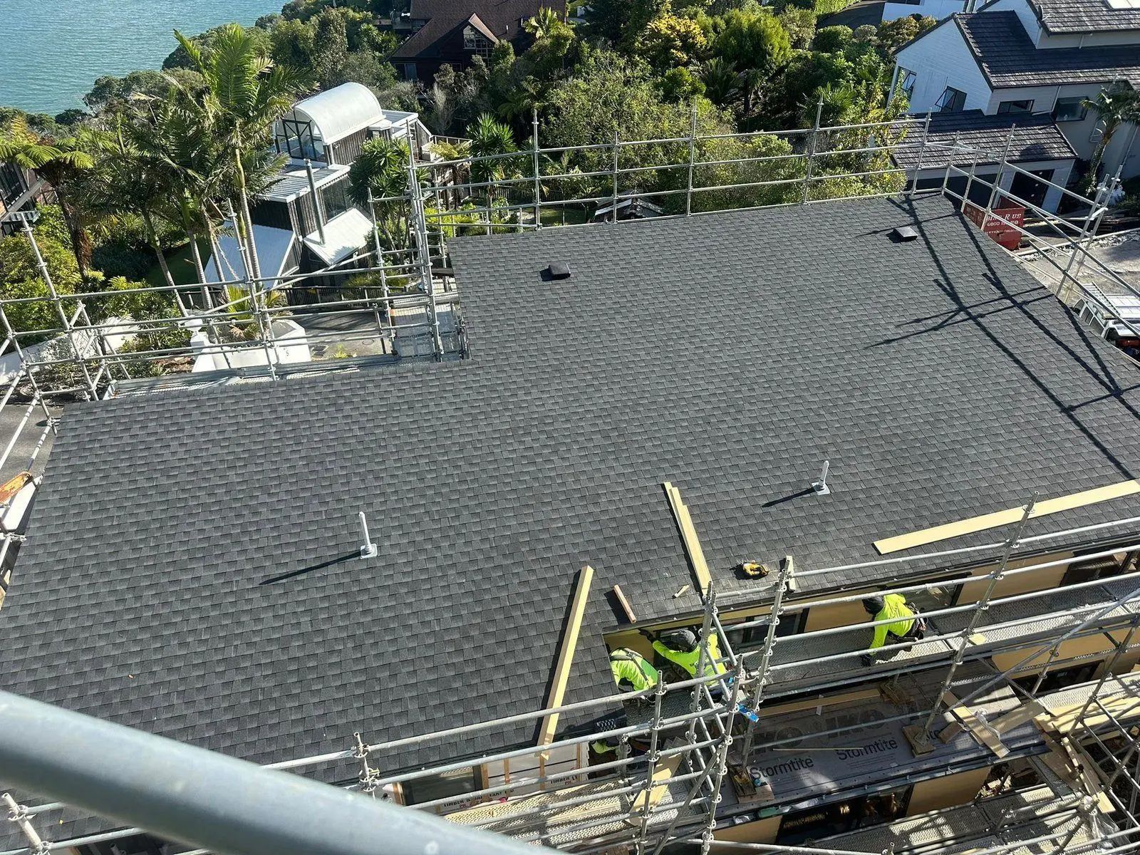 Asphalt shingle reroof underway in West Auckland