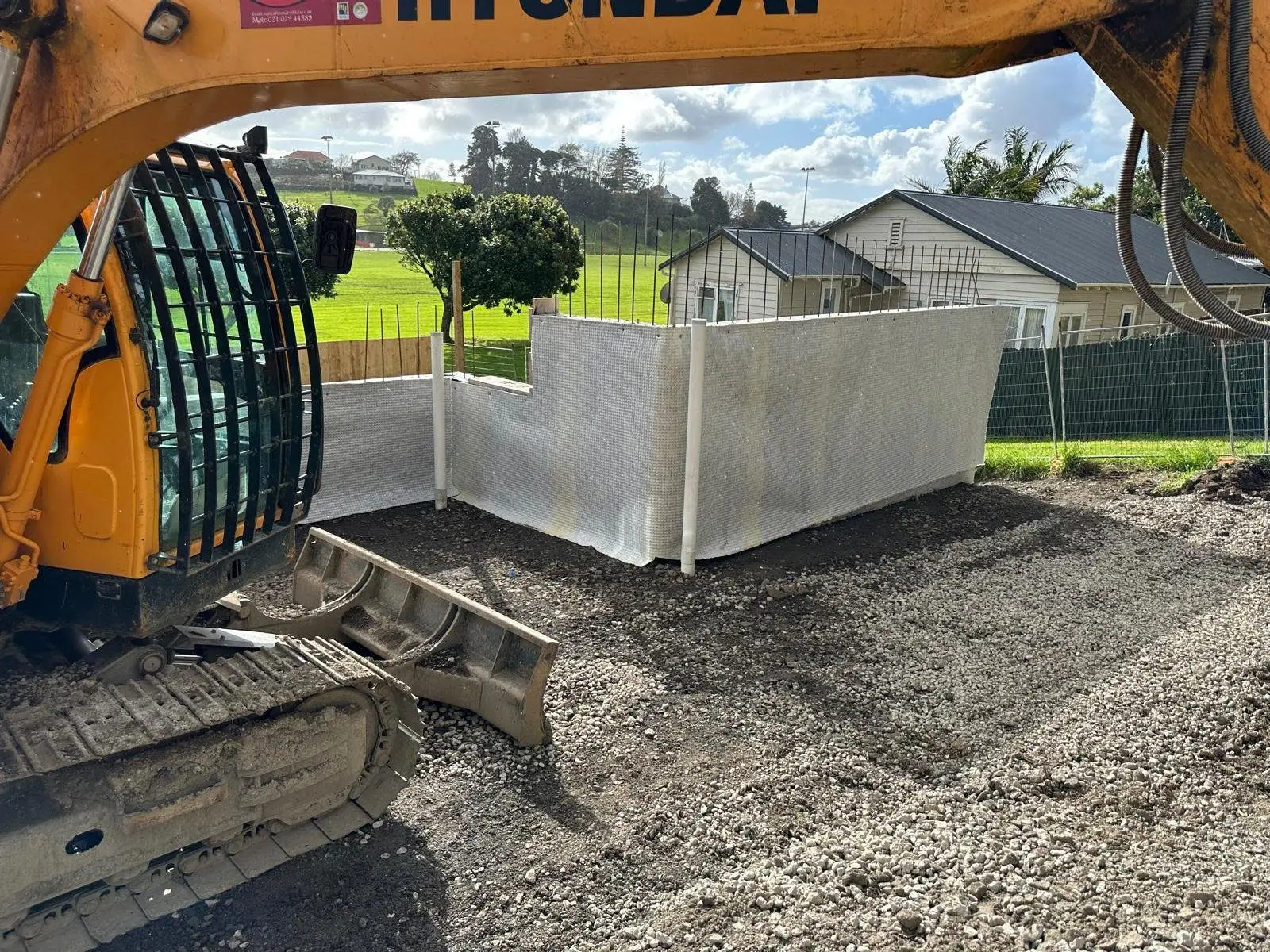 Below-ground tanking membrane installed on an Auckland retaining wall