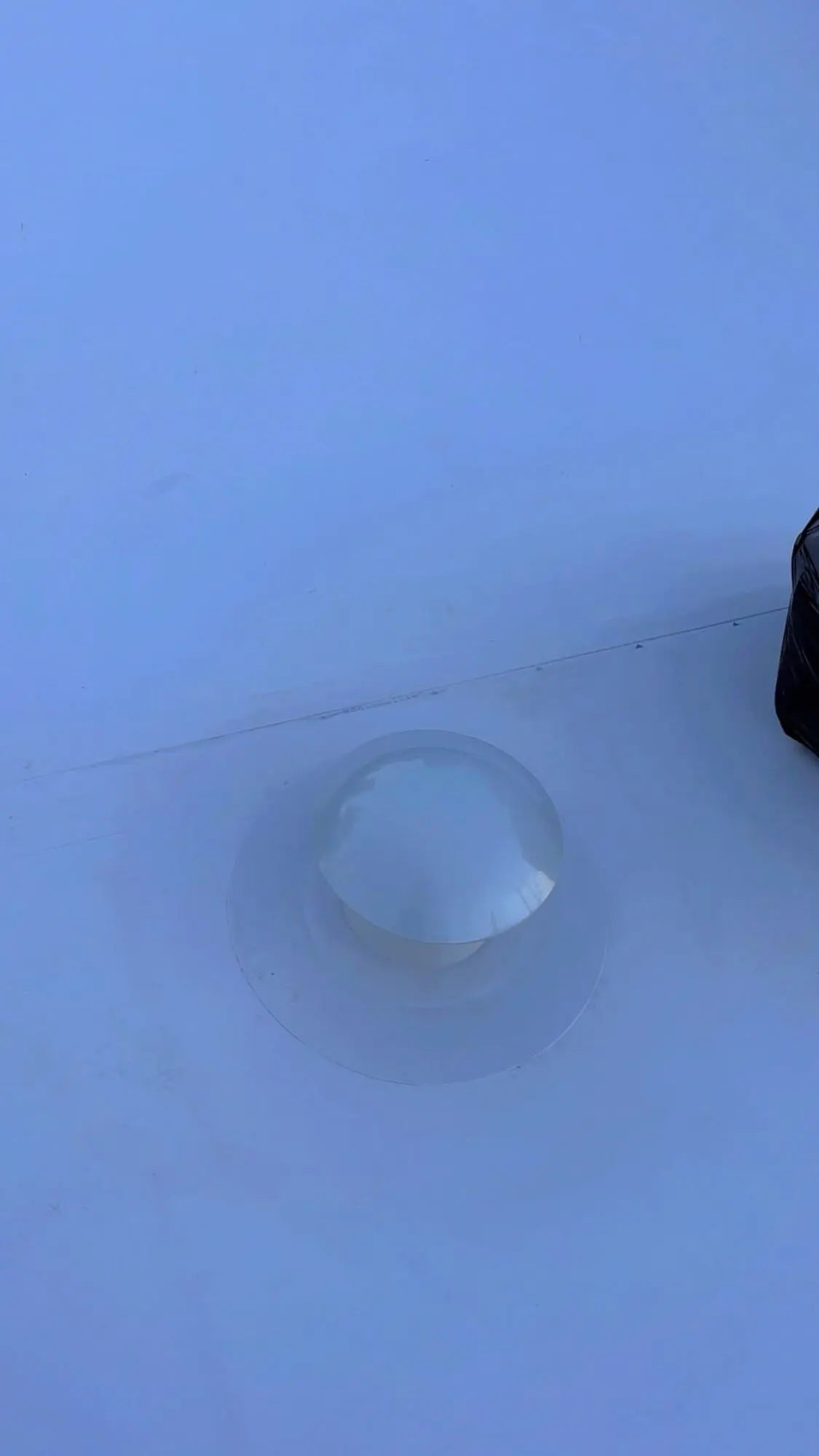 Membrane roof vent dome sealed into the roof surface
