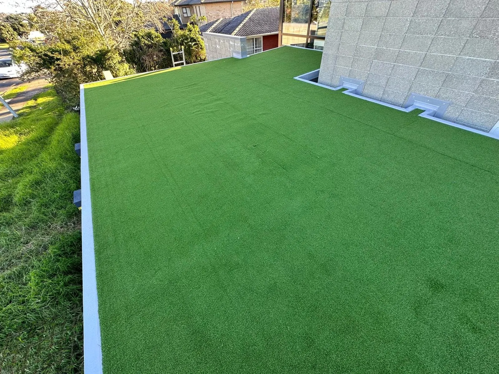 TPO membrane deck finished with artificial turf on an Auckland home
